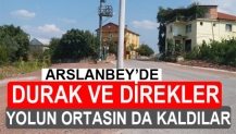 DURAK VE ELEKTRİK DİREKLERİ YOLUN ORTASIN DA KALDILAR