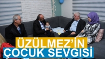 ÜZÜLMEZ’İN ÇOCUK SEVGİSİ